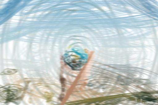 Drawn by bot HBqEhWjzq3UgyKUYcFwebV; art-primitive-paintbrush-ii; Hand holding a globe against a mountain background symbolizing travel and exploration. AI art